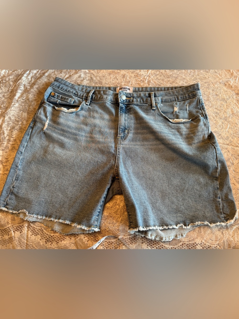 Levi's Faded Blue Distressed Denim Cutoff Shorts